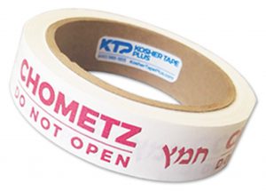 roll of tape printed with "Chometz -- do not open" in red ink
